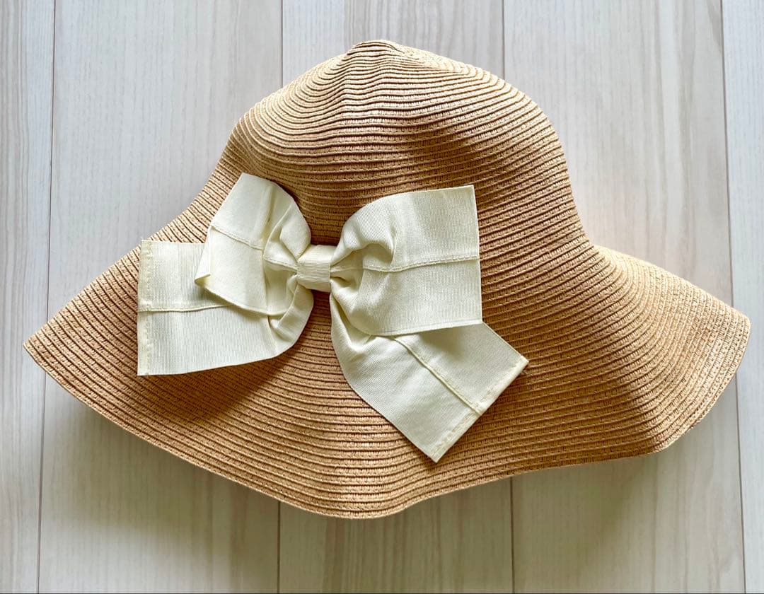 New, tags removed. BlueBulet Blue Bluee straw hat. Approximately 58cm.